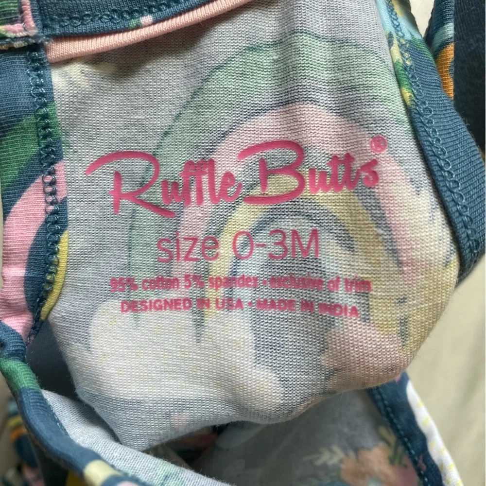 NWT RuffleButts Dark Blue & Pink Floral Rainbows Ruffles Bubble Romper, 0-3M
